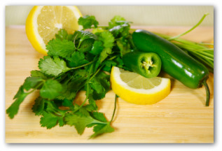 fresh cilantro, lemon slices and peppers