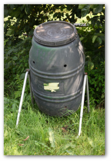 compost bin tumbler in a backyard