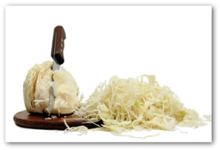head of cabbage partially cut up for sauerkraut