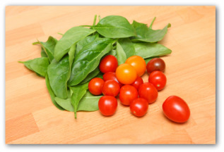 fresh spinach and cherry tomatoes