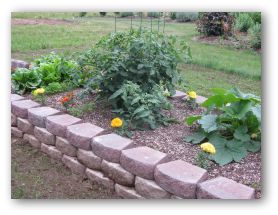 building a raised vegetable garden with concrete garden wall blocks