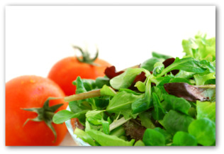 fresh salad with leaf lettuce and tomatoes